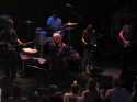 Am 16.07.2009 traten Eric Burdon & The Animals in der Hamburger Fabrik vor ausverkauftem Haus auf.
Pressenotiz:  DER ROCKER-PR�SIDENT - Tierisch gut: Sie gaben ein Konzert der alten Schule. Seinen Er�ffnungssong hatte Eric Burdon mit "When I was young" gut gew�hlt. Mit 68 Jahren ist das britische Alpha-M�nnchen der Animals ja nicht mehr das j�ngste, auch wenn es mit Silberhaar, Dreitagebart, Kettchen und durchaus m�chtigen Oberarmen aussah wie der Pr�sident einer gef�hrlichen Biker-Gang - ein Grund mehr, Burdon nicht auf das Thema Rocker-Rente anzusprechen. Das Konzert in der Fabrik tat ein �briges. Burdon zeigte, dass er immer noch eine Stimme wie ein Donnerblech hat.

Bandbesetzung: Eric Burdon - voc., Brannen Temple - drms., Terry Wilson - bss., Red Young - keybd., Billy Watts - guit.,  Georgia Dagaki - viol. + voc.

Foto: Ralf Fr�hlich