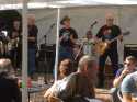 TODAY Sept. 9th, 15 is Ron`s 70th Birthday!!! CONGRATULATIONS.
On this photograph he appears with his Band at a huge bikers meeting close to his home town with thousands of guests.

Ralf